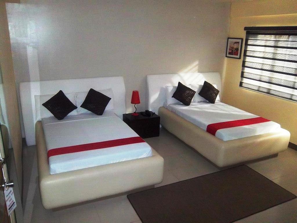 Hotel Cara Lipa City Habitación foto