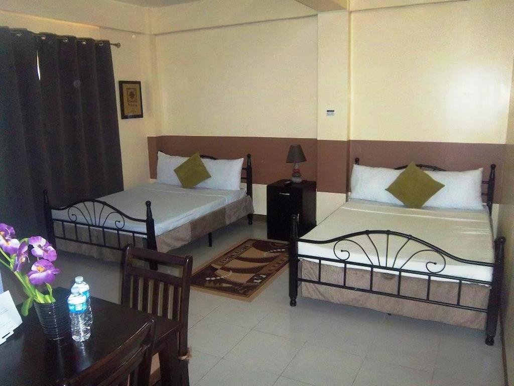 Hotel Cara Lipa City Habitación foto