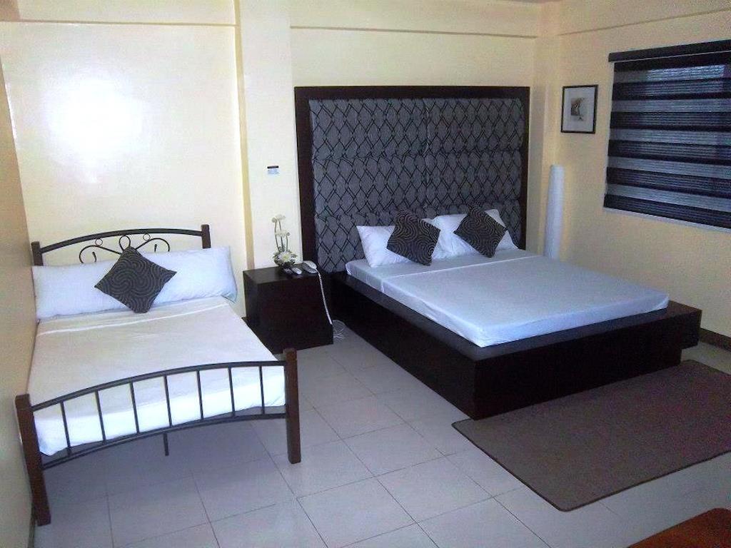 Hotel Cara Lipa City Habitación foto
